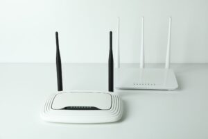 Wi-Fi routers with external antennas on white background